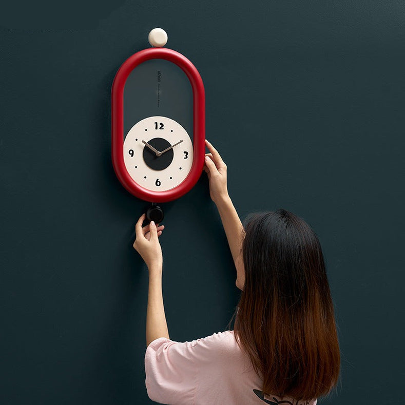 Ovaltic - Modern Wall Wonders Clock – Unique Oval Design with Pendulum