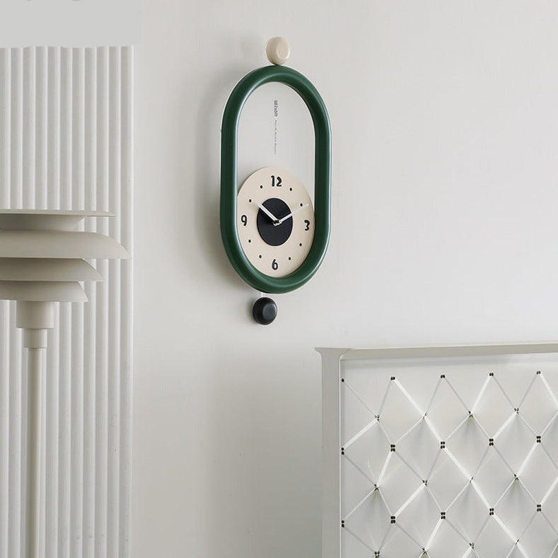 Ovaltic - Modern Wall Wonders Clock – Unique Oval Design with Pendulum