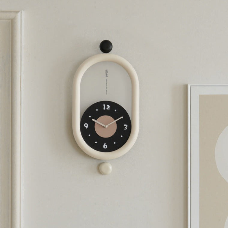 Ovaltic - Modern Wall Wonders Clock – Unique Oval Design with Pendulum